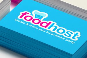 foodhost logo design on a business card