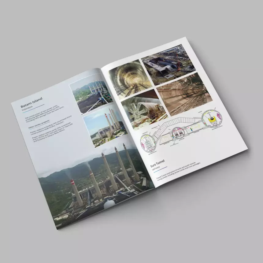 Mock up of a construction business brochure showing pictures and projects in progress and technical drawings