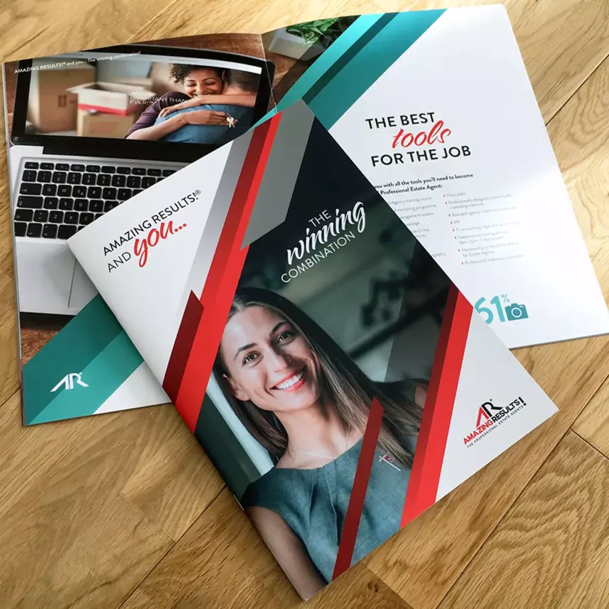A photograph of front cover and internal spread of an Estate Agency franchise business brochure
