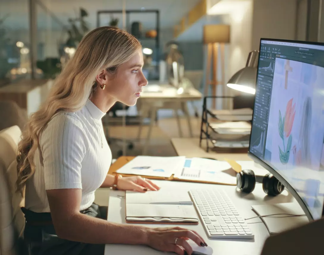 Female designer working at her computer