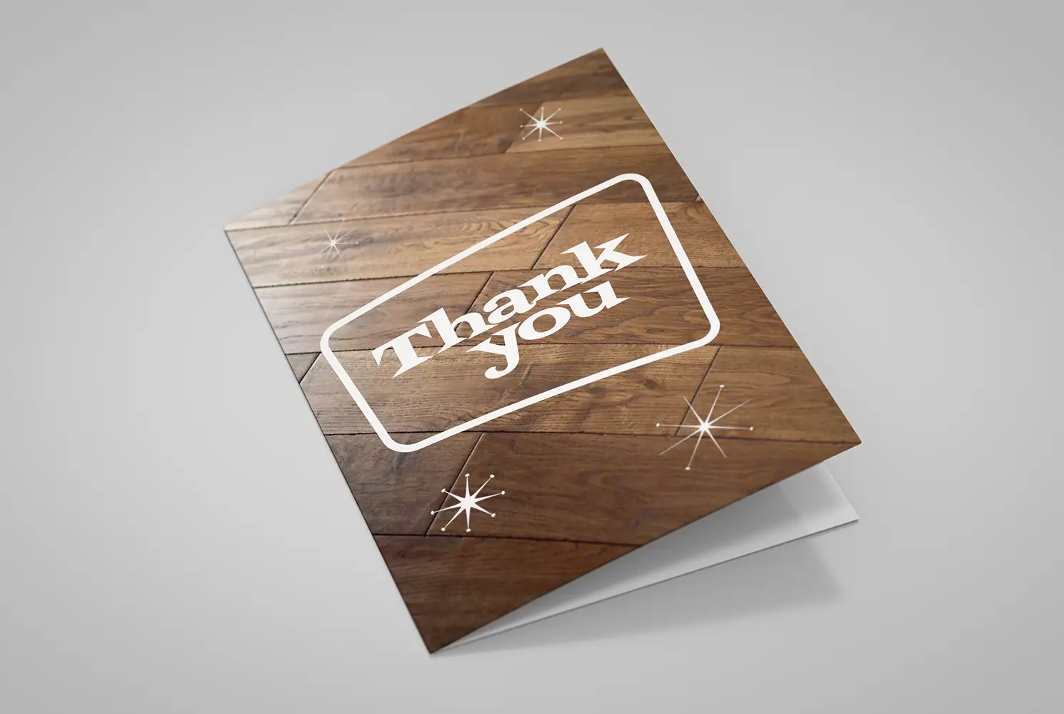 Mock up of the Thank you card showing the front page