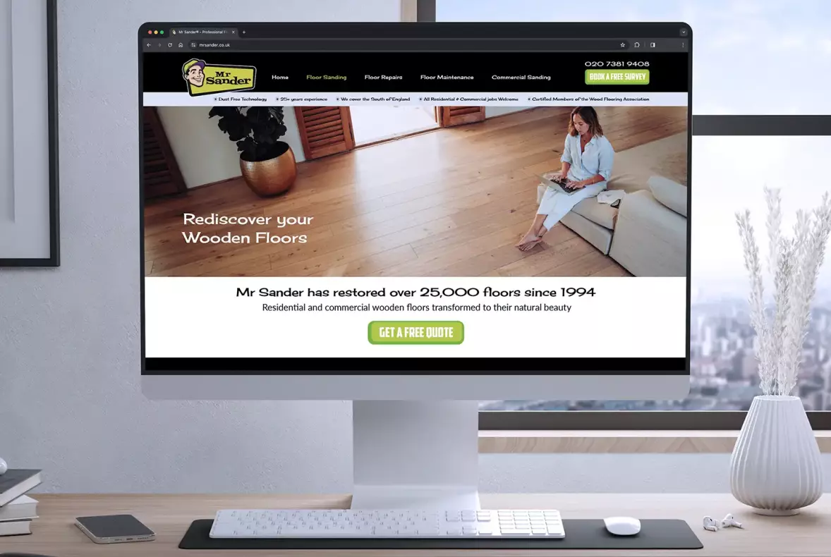 A mockup of the new Mr Sander website design shown on a desktop Mac screen stood on a modern and minimal desk