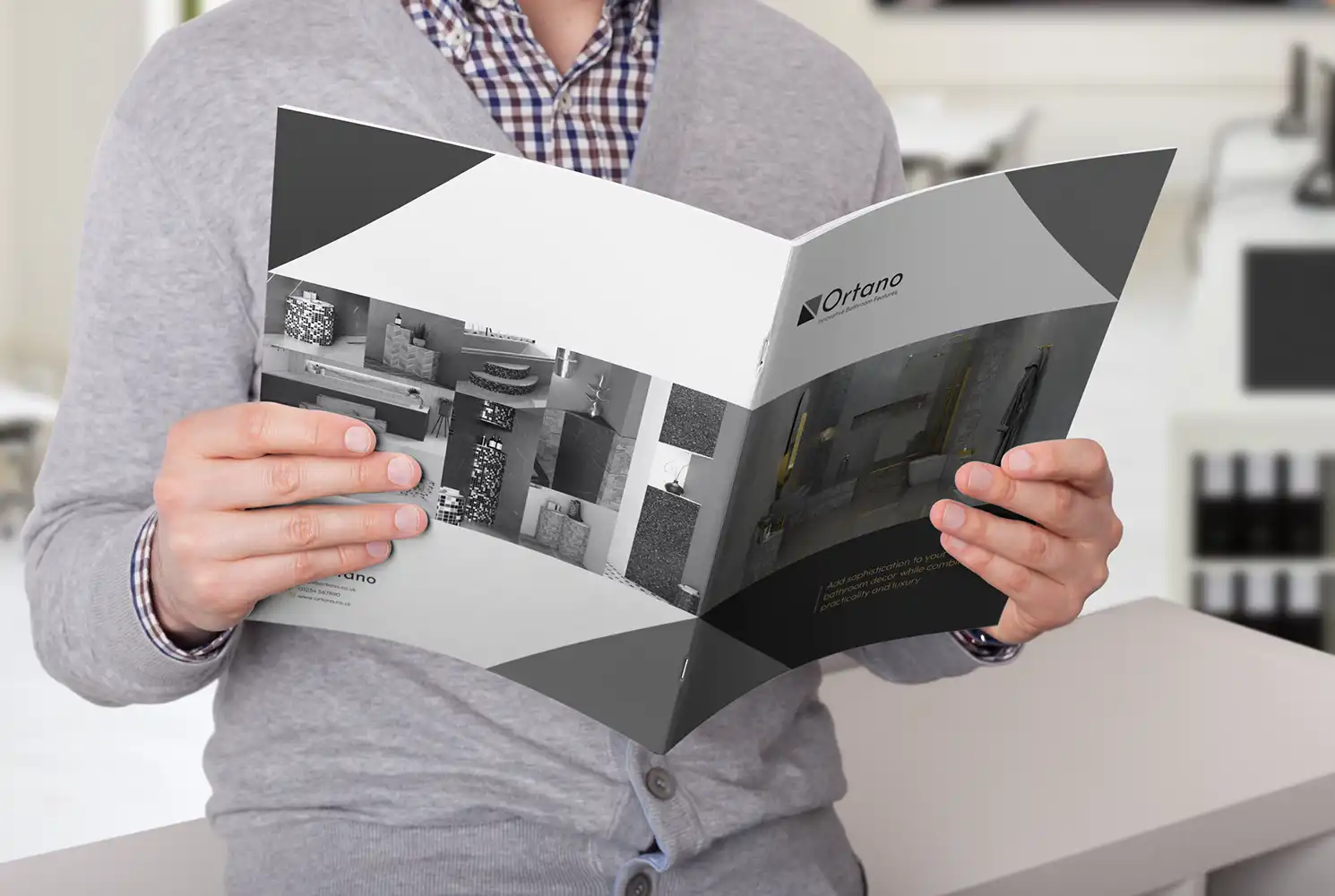 Man holding and looking through the Ortano brochure